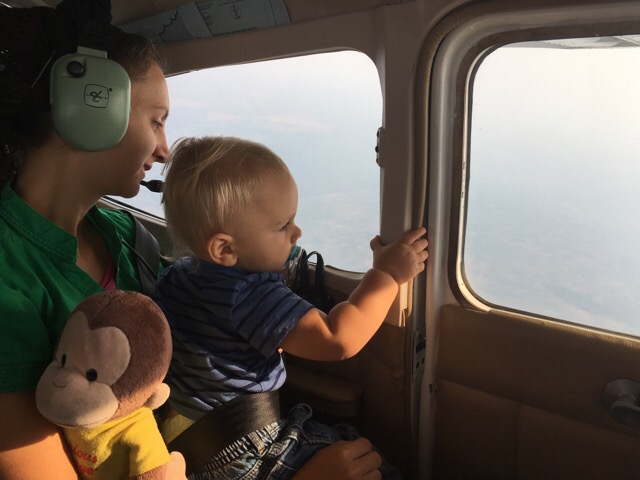 Boston enjoyed this flight more than our trip in. He is noticing a lot more than he was three months ago.